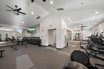 Fitness center with brand new state-of-the-art precor cardio and strength equipment, peloton bikes and row machines
